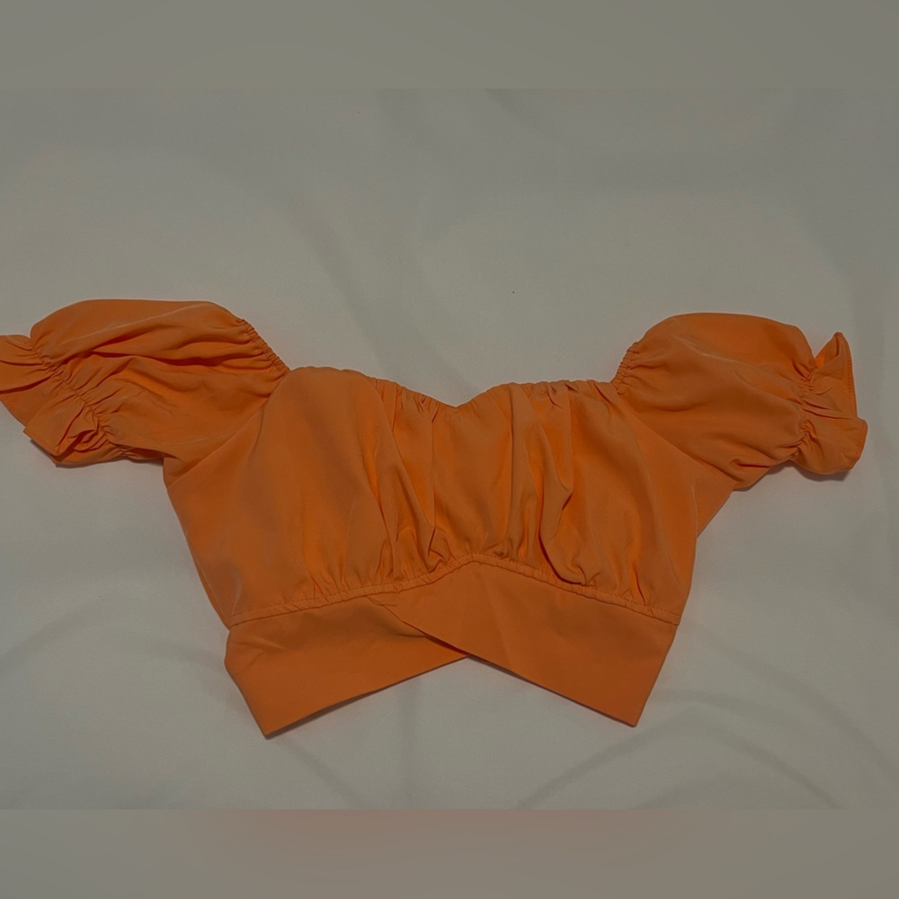 Women’s size M crop top. Off the shoulder, never worn.